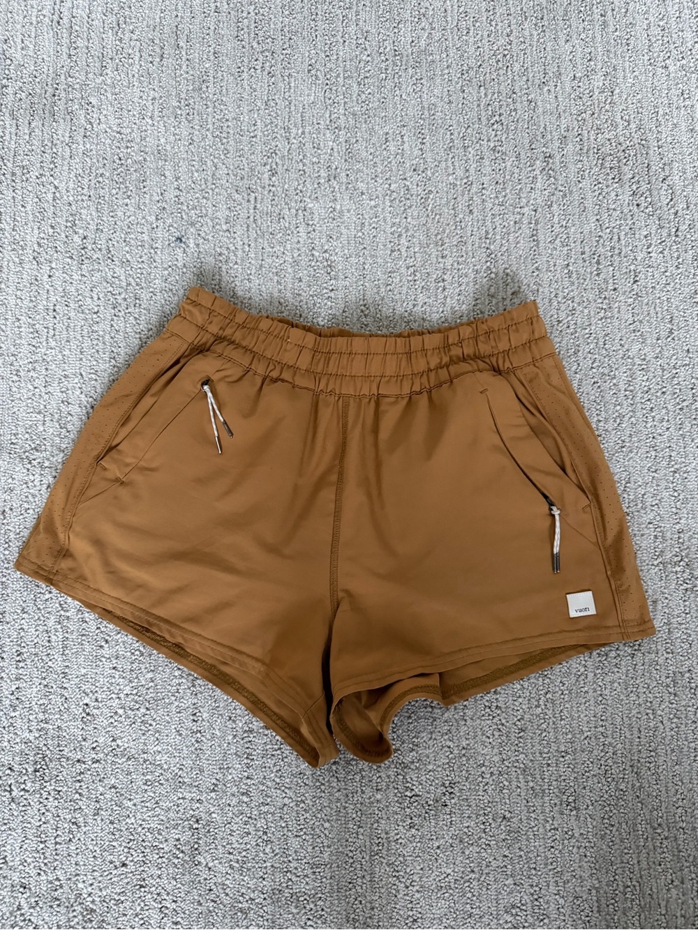 Vuori Women's Athletic Shorts in Camel Brown